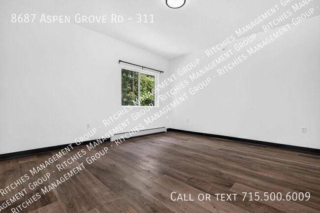 Building Photo - 8687 Aspen Ln