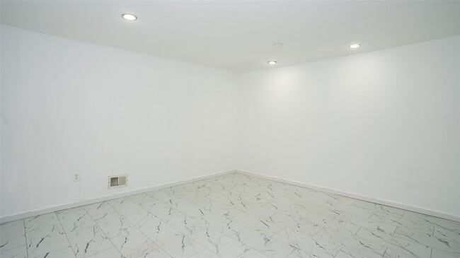 Building Photo - 223-39-223-56 56th Rd