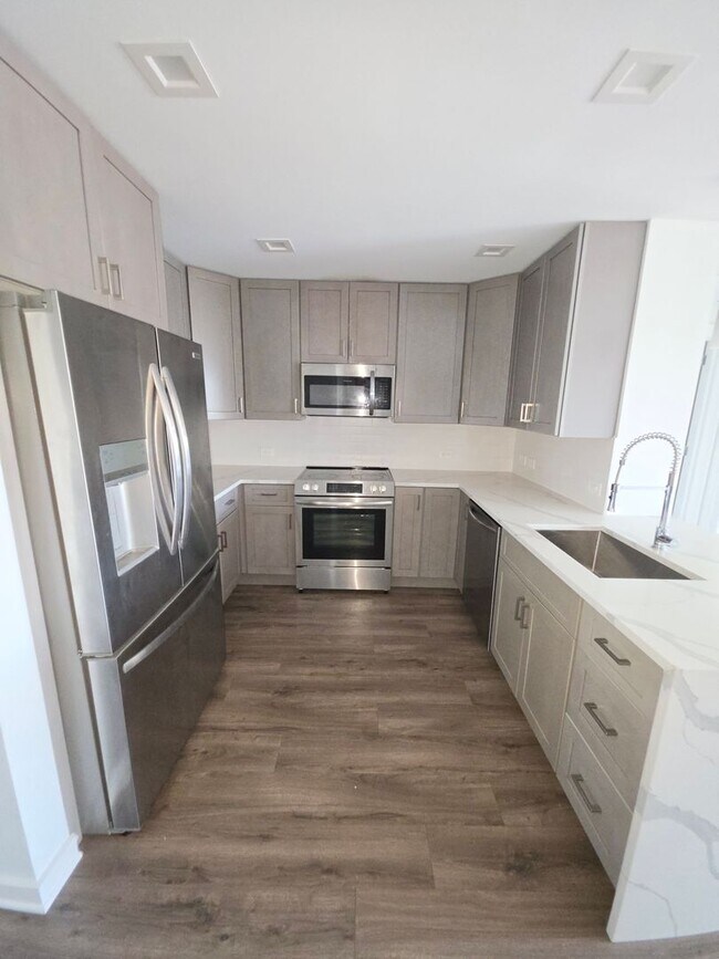 Building Photo - Be the first to occupy this renovated 2-bedroom & 2 full bathrooms condominium with lots of ameni...