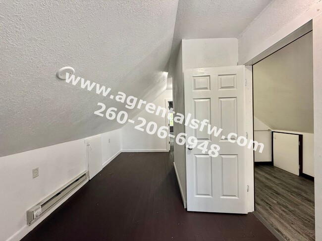 Building Photo - 4 Bedroom House- (Section 8 OK!)