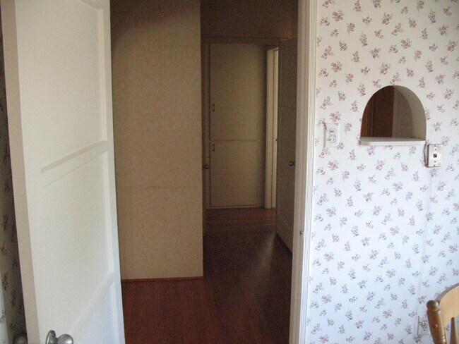 View from kitchen to entry room and hallway - 3121 W Wyoming Ave