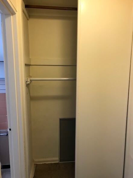Tall closet showing two rods - 105-25 67th Ave