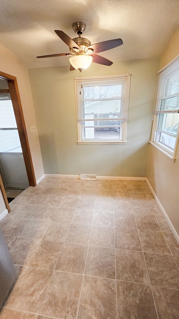 Building Photo - Charming & Updated 3-Bedroom Home with Sunroom, Fireplace & Garage