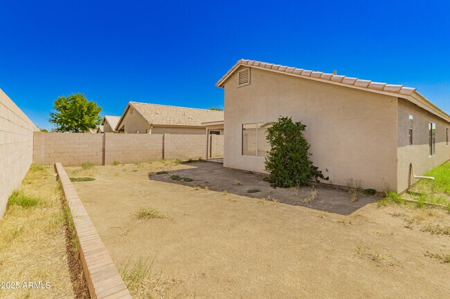 Building Photo - 8638 W Mauro Ln