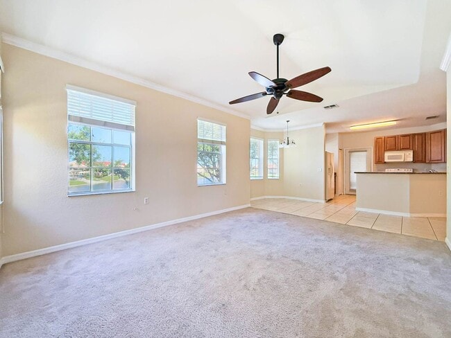 Building Photo - Beautiful 3-Bedroom Condo with 2-Car Garag...