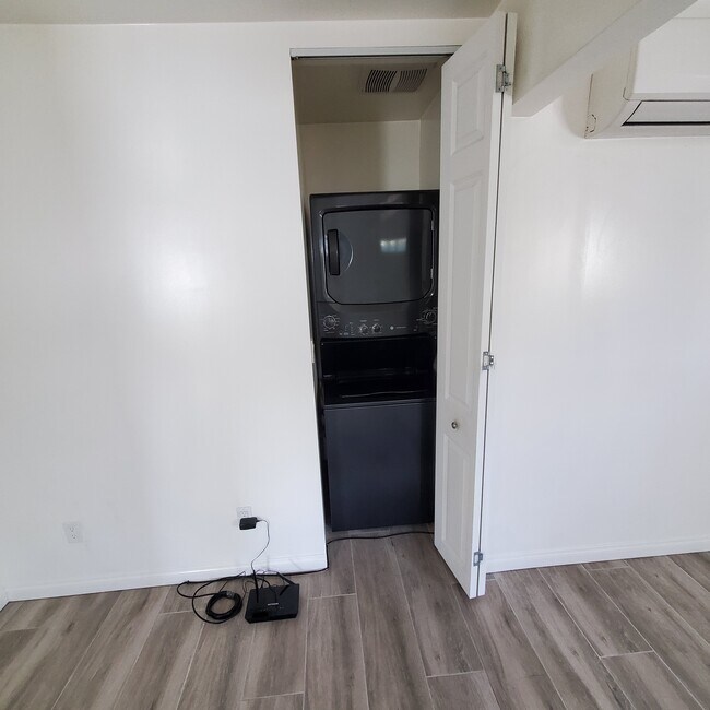 GE Washer and Dryer combo unit. - 5731 Fulton Ave