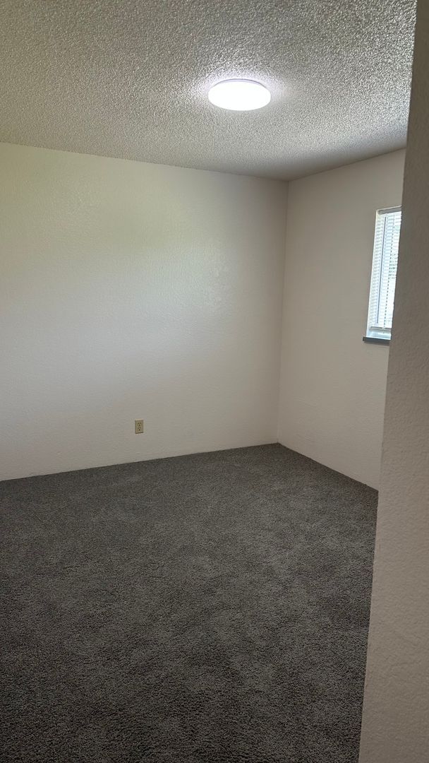 Building Photo - Cozy Three Bedroom Home