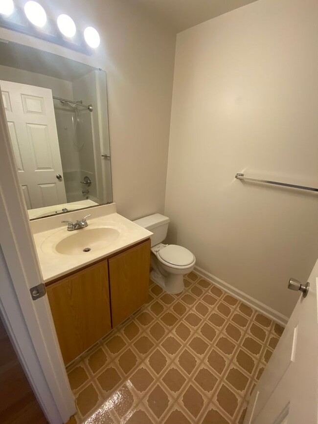 Building Photo - Application Fee Waived For Fall! A spacious three bedroom, two and one half bath townhouse locate...