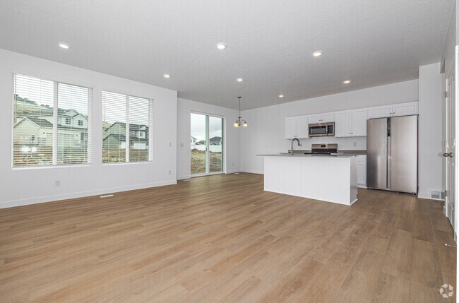 3BR, 2.5BA - 2,300SF - Living Room/Kitchen - Hidden Hollow Townhomes