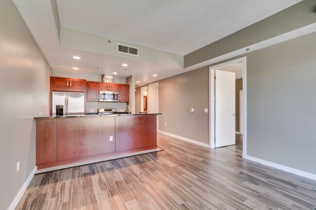 Building Photo - Iconic Strip-View Luxury | Elegant 1BR + Den High-Rise Residence