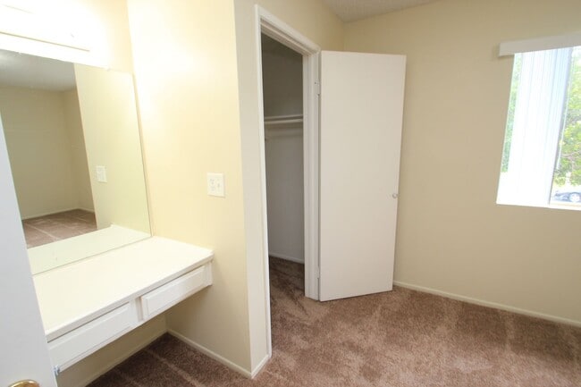 Building Photo - Welcome to this beautifully updated two-story condo