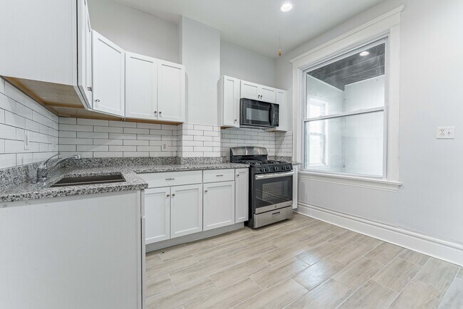 Building Photo - 1632 S Drake Ave