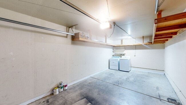 Building Photo - Cozy 1 bedroom 1 bath end unit condo with 1 car garage and private patio located next to Peterson...