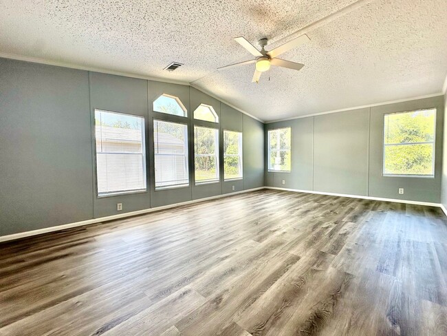 Building Photo - Privacy and Space in this 3/2 Home at the ...