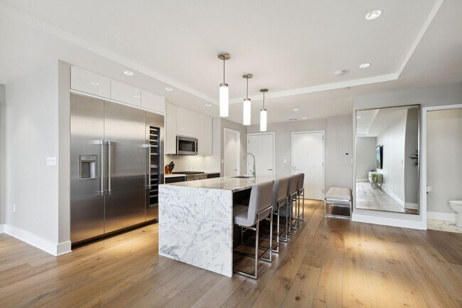 Building Photo - Elegant 2BR at The Adora | 1,500+ SF, Chef’s Kitchen & Garage Parking!