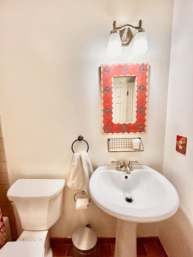 Building Photo - Beautifully renovated 4BR/3BA rambler with wraparound porch and garage