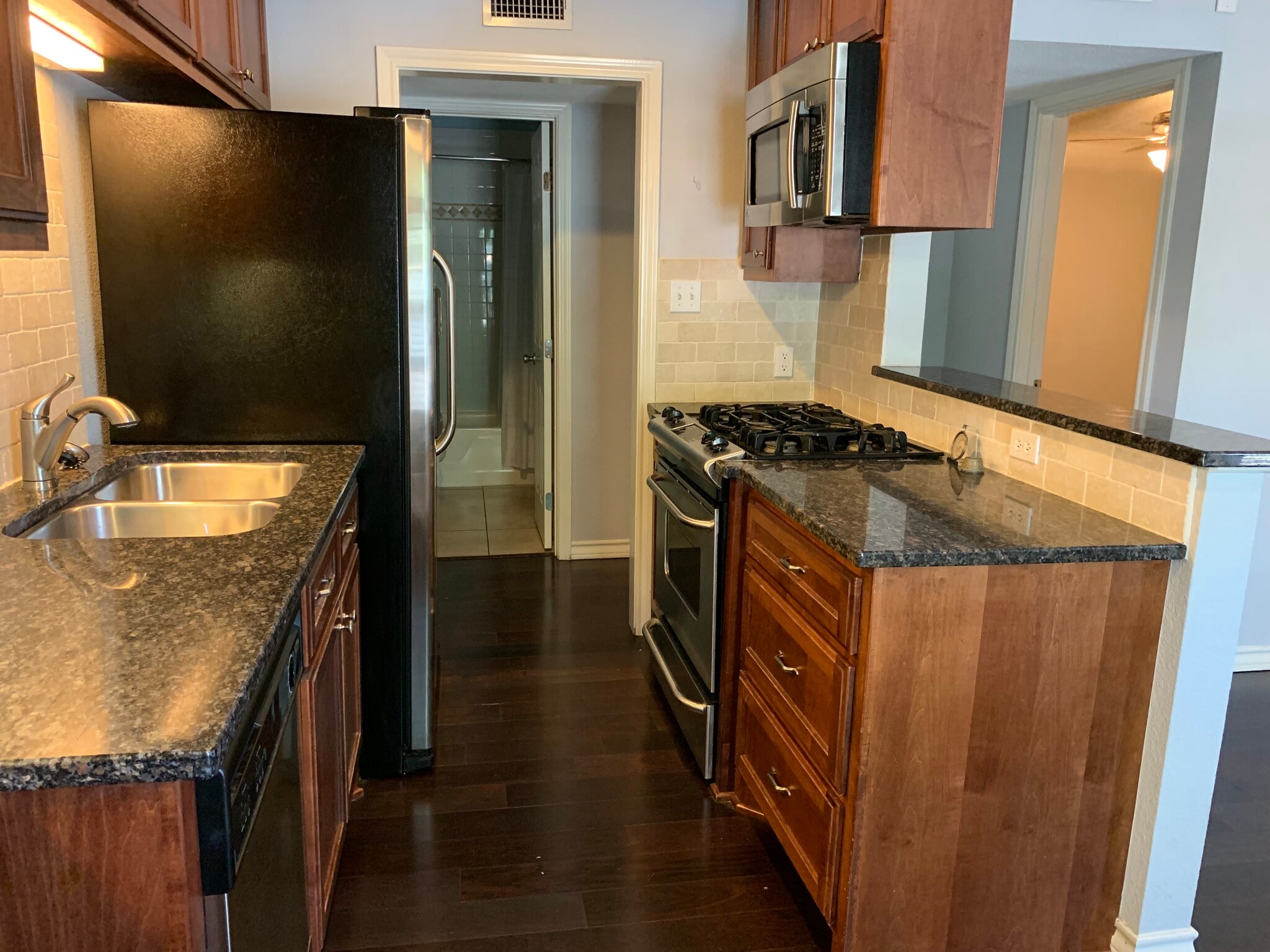 Loop around kitchen. Enter from hall and from dining area. 407 E 45th St. Austin, TX 78751 - 407 E 45th St #116