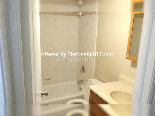 Building Photo - Charming 4-Bedroom Home with Hardwood Floo...