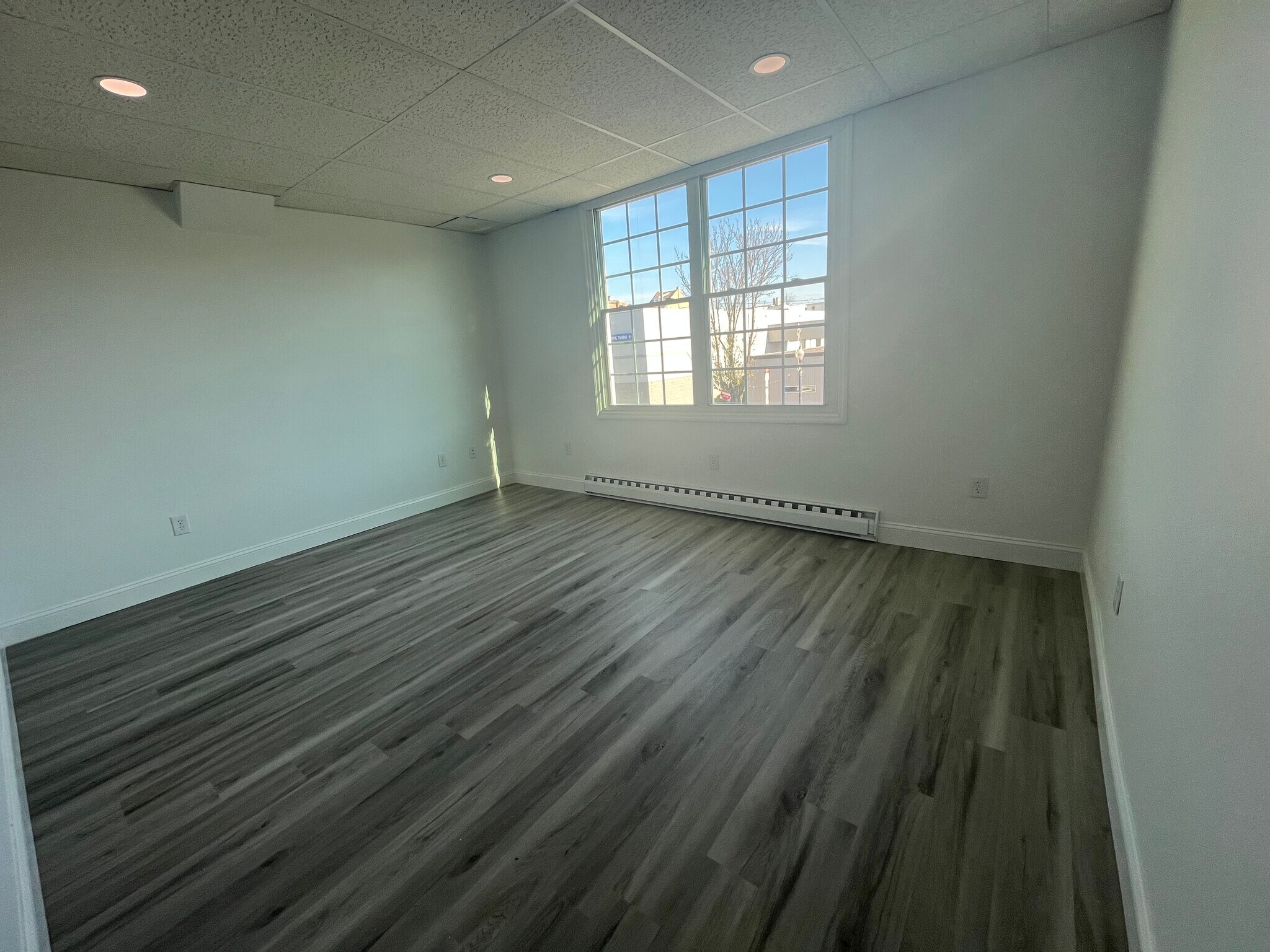 Living room windows facing front street - 36 N Main St