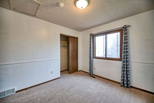 Building Photo - 4-Bedroom Home Near CSU | Fenced Yard & 2-Car Garage