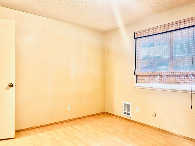 Building Photo - Charming 3BR/1BA w/ 1-car garage, long driveway, fenced yard, wood stove & shed/workshop.