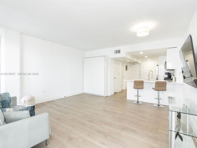 Building Photo - 10275 Collins Ave