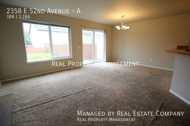 Building Photo - Spacious South Anchorage Townhome! Huge fe...