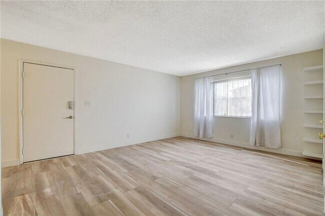 Building Photo - Completely Updated and Move-In Ready, 2 bedroom, 1 bath first floor unit!
