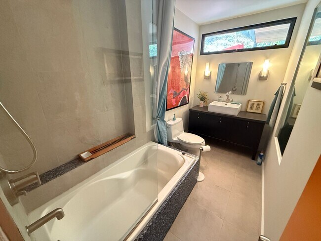 Building Photo - Mid-Century Modern 3-Bedroom Home with Pri...