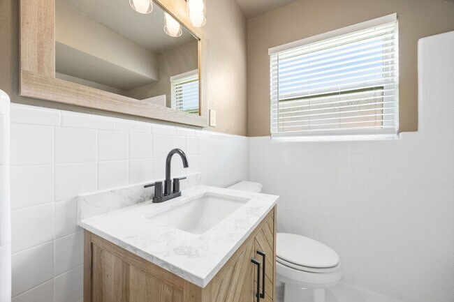 Building Photo - **$40K+ IN UPGRADES AND A FENCED BACKYARD WITH TWO STORAGE BUILDINGS**