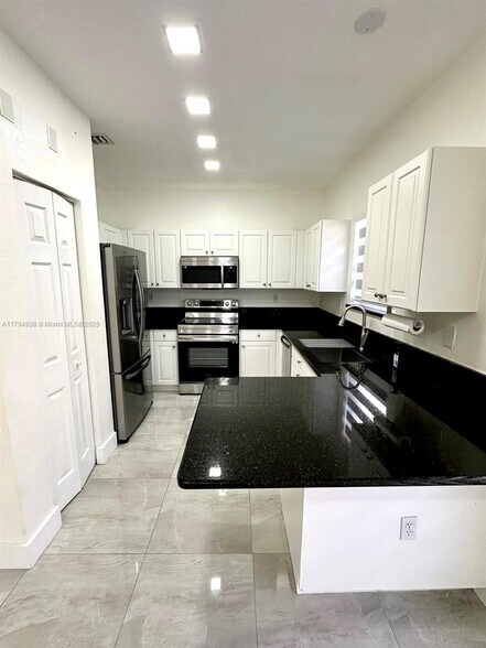 Building Photo - 9285 SW 220th Ter