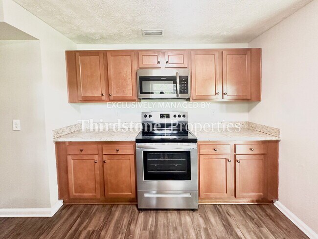 Building Photo - 4516 Key Woodley Dr S