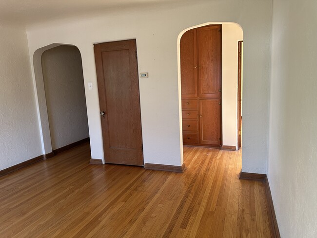 From living room. Front door to left, bedroom right. - 2233 Kearney St