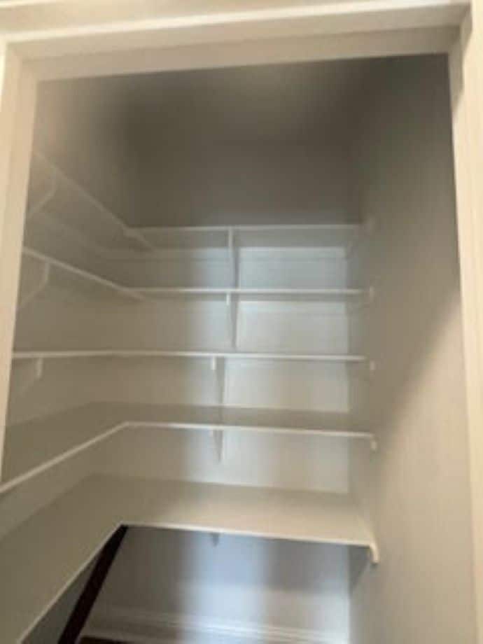 linen closet off primary - 7463 Knollwood Ct