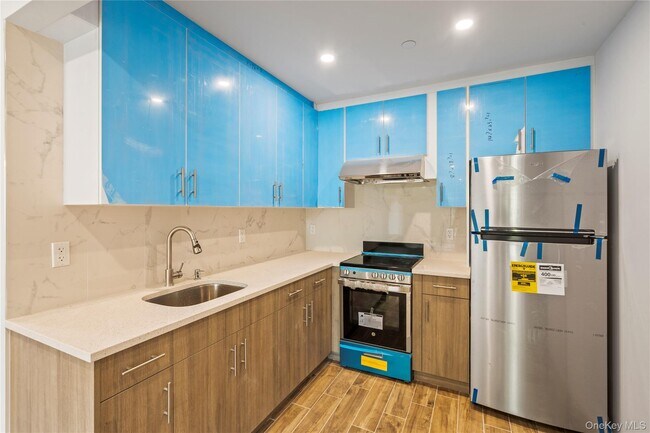 Building Photo - 213-41 38th Ave