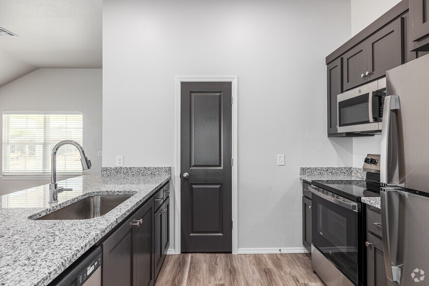 A - 4BR, 2BA - 1240SF - Kitchen - Enclave Estates at Chickasha