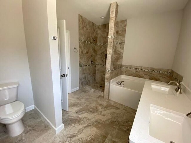 Building Photo - 3-Bedroom Brick Home with Modern Finishes & Large Yard!