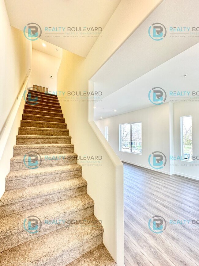 Building Photo - Modern 2 Bedroom 2Bath  Townhome with Dual Patios & Designer Finishes near Truckee River