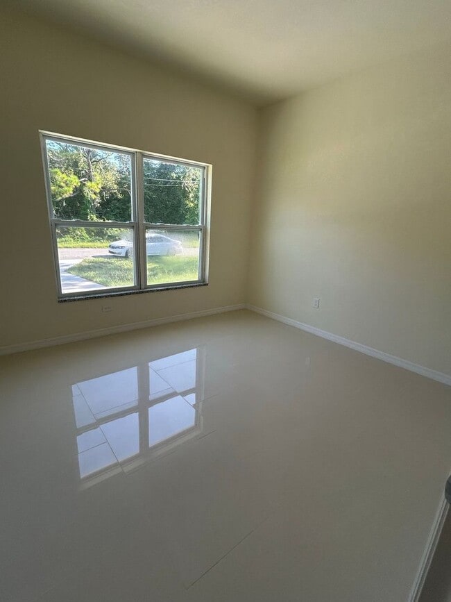Building Photo - COZY COTTAGE 2/2 IN LAKE PLACID FL