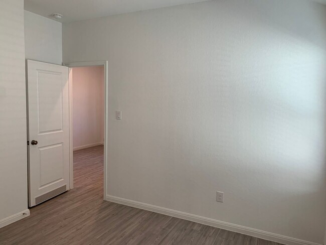 Building Photo - Luxury Vinyl Plank (No Carpet) /  Fridge Included / Office / Covered Back Patio / CISD