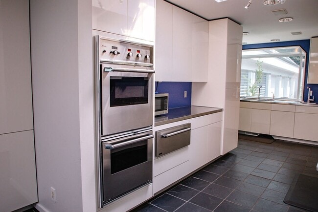 Building Photo - One of a kind private estate on Gravelly Lake in Lakewood