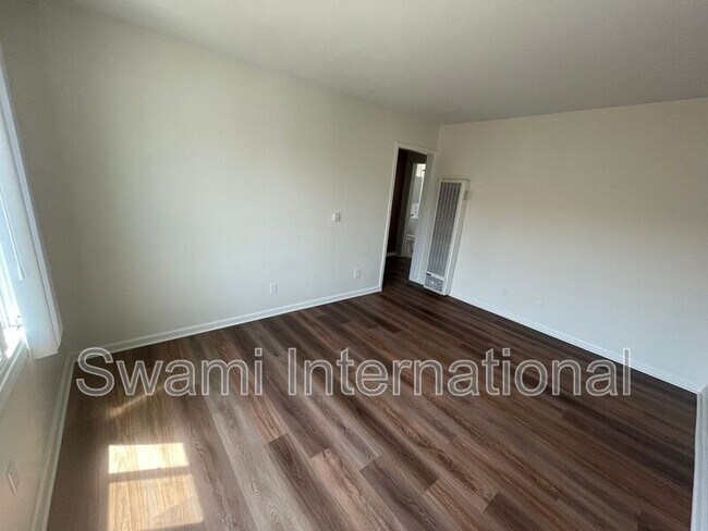Building Photo - 9449 Normandie Ave