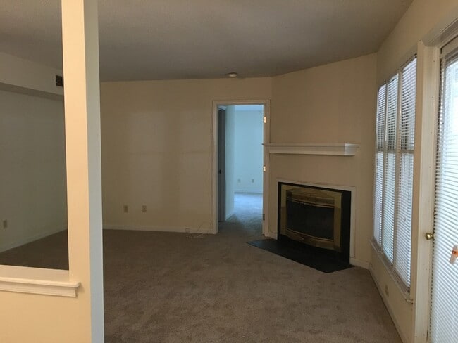 Building Photo - ONE LEVEL CONDO NEAR REX HOSPITAL -Firepla...