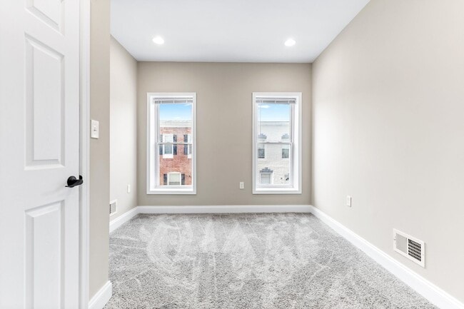 Building Photo - Parkside Haven: Contemporary 2-Bedroom Row Home Near Patterson Park