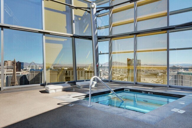 Building Photo - Stunning Strip Views from this Fully Furnished Studio Residence.