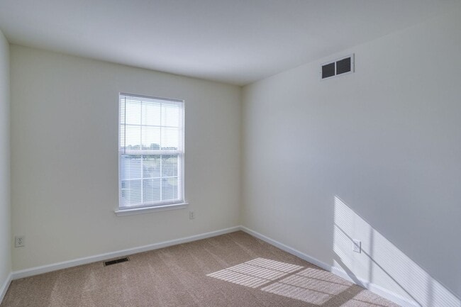 Building Photo - New, New, New - Spacious 3 Bedroom Townhouse with a Finished Basement !!