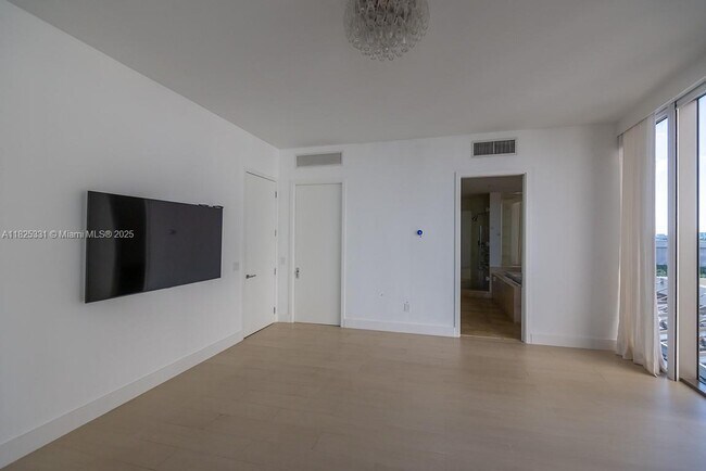 Building Photo - 9701 Collins Ave