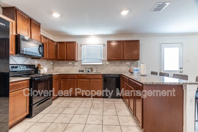 Building Photo - 10406 Labrado Dr