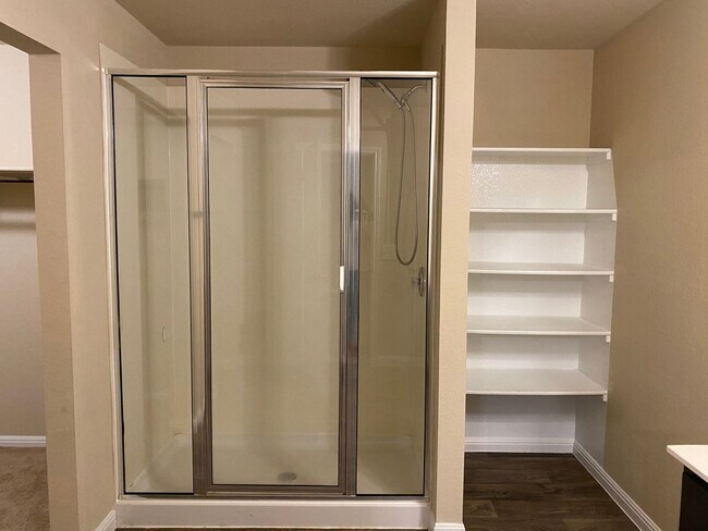 Building Photo - Three Bedroom, Two Bath, Two Car Garage, Washer and Dryer are included.