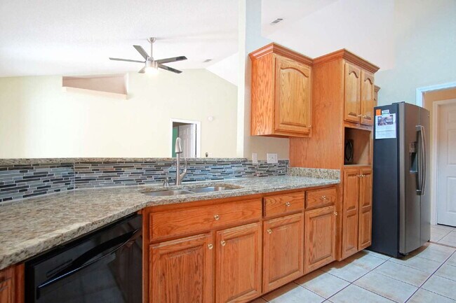 Building Photo - Spacious Oak Meadows Home in Milton with Multiple Living Areas, Fenced Yard & 1/2 Off First Month...